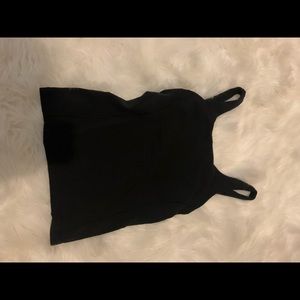 Black lululemon tank top with bra built in; size 8